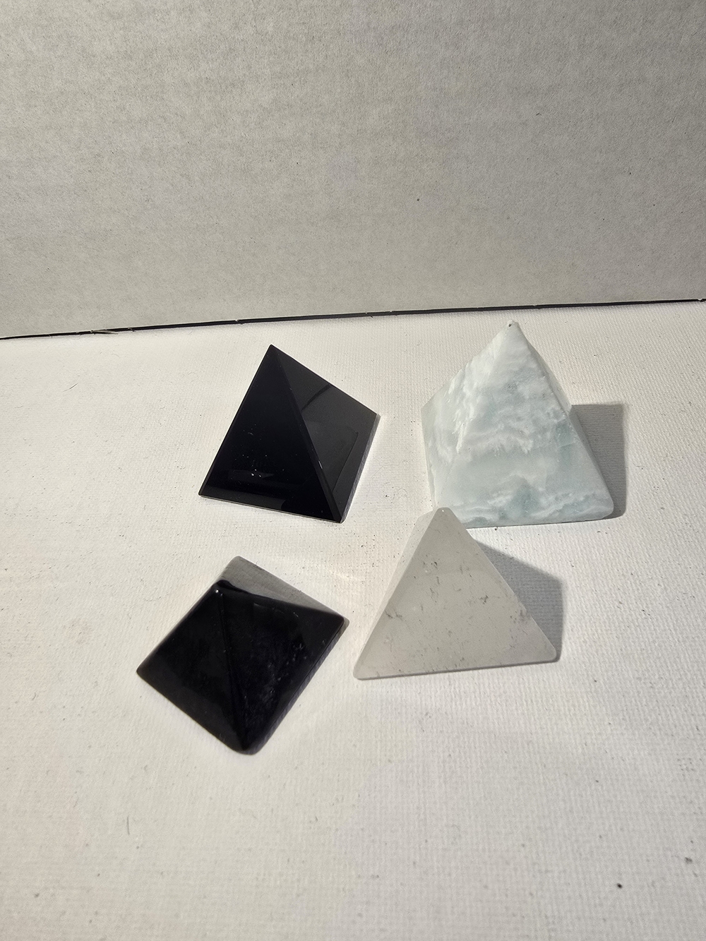 4 Crystal Pyramid Bundle | Black Obsidian (2), Clear Quartz & Caribbean Calcite - Picture 2 of 3